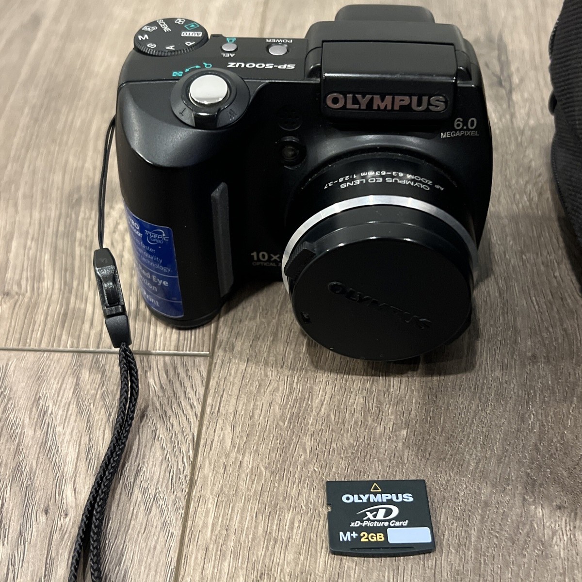 Olympus SP-500 UZ Ultra Zoom 6MP Digital Camera 10X XD 2GB