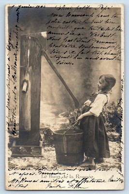 c1905 Young Girl Fetching Water From A Rustic Well RPPC Photo Antique Postcard