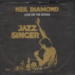 Neil Diamond Love On the Rocks 7" vinyl UK Capitol 1980 in pic sleeve has frayed - Picture 1 of 3