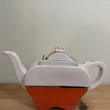 Fraunfelter China Teapot, Art Deco era (1920s-1930s) Orange White Sliding Lid