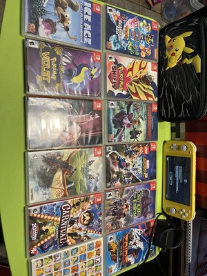 Nintendo Switch Lite With 12 Games, Carrying Case And Charger.