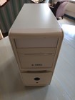 Vintage ATX computer case with front USB/audio and universal optical drive cover