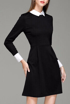 black long sleeve dress with white collar and cuffs