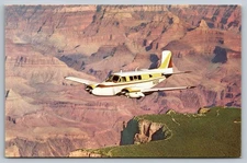 Vintage 1960 Beechcraft Model 65 Queen Air over Grand Canyon Postcard