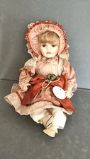 Leonardo Porcelain Sitting Down Doll Andrea Approx 12" Blonde Hair Blue Eyes