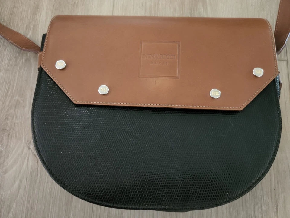 Cartera Nina Ricci negra y tostada Foto 2 de 4