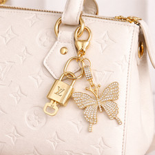 Louis Vuitton Gold Padlock Key   Authentic LV Charm  Butterfly Keychain