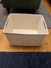 Curver Jute storage basket in an off-white or cream color.