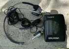 SONY Walkman WM-EX10 Cassette Player For REPAIR or PARTS With 2 Headphones