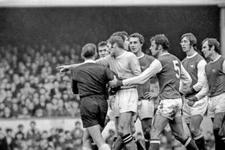 Arsenal v Manchester City Tony Book pointing City's captain appeal- 1969 Photo