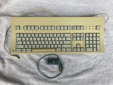 Griffin iMate ADB to USB adapter + Apple Extended keyboard M0115. 