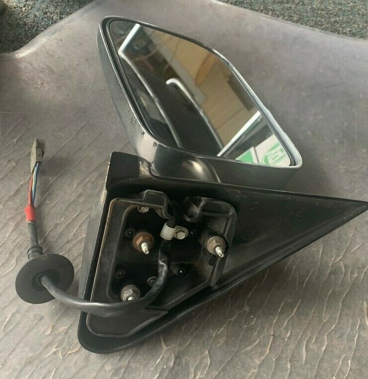 Driver Side Power Door Mirror For 2000-2004 Nissan Xterra - Textured Non-Heated Replacement