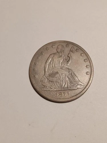 1877 seated liberty half dollar, motto in FINE, variety four