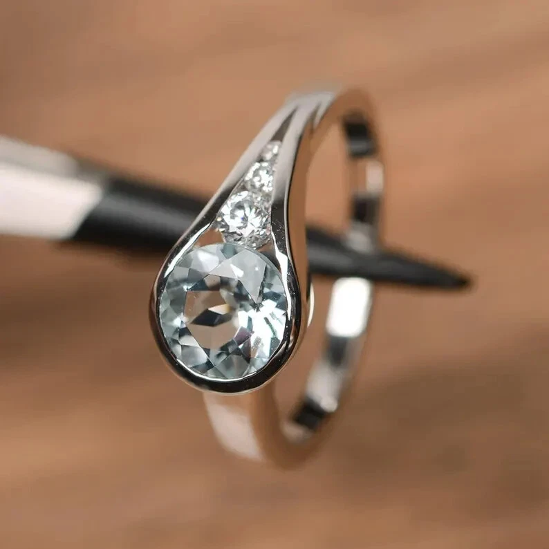 Обручальное кольцо с сертифицированным натуральным аквамарином и бриллиантом 1,15 карата из цельной платины 950 - Изображение 2 из 4