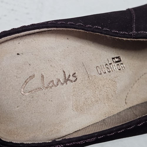 Clarks burgundy slip on slippers with a cute button
