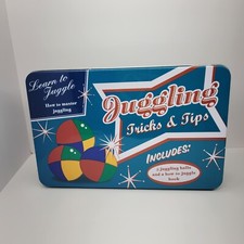 Juggling Tricks and Tips Includes Three balls and Instruction Book In Tin