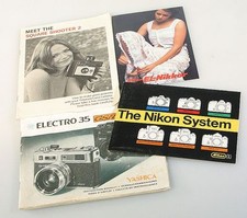 POLAROID SQUARE SHOOTER 2, NIKON LITERATURE AND YASHICA MANUALS, SET OF 4