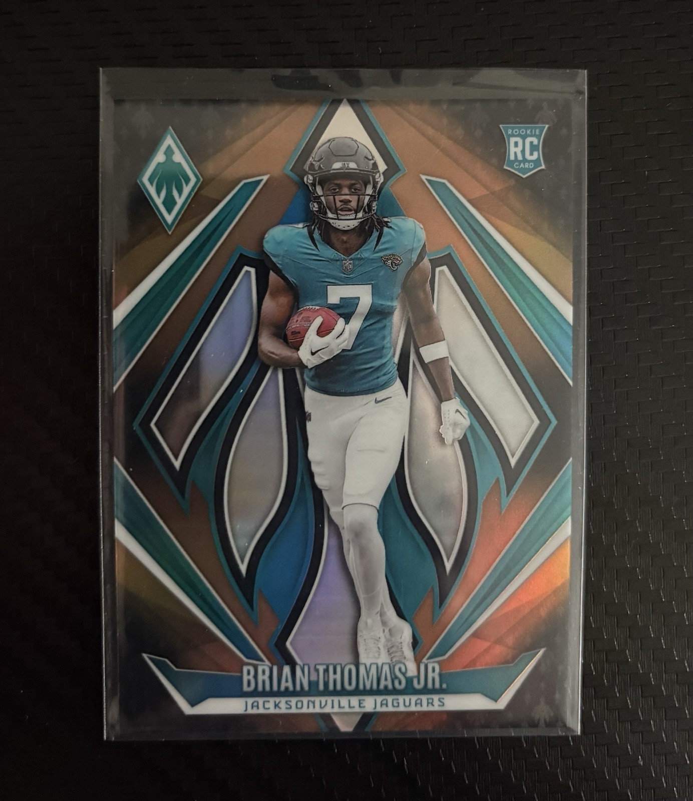 2024 Panini Phoenix - Rookies Brian Thomas Jr. #164 Bronze Fade /125 (RC)