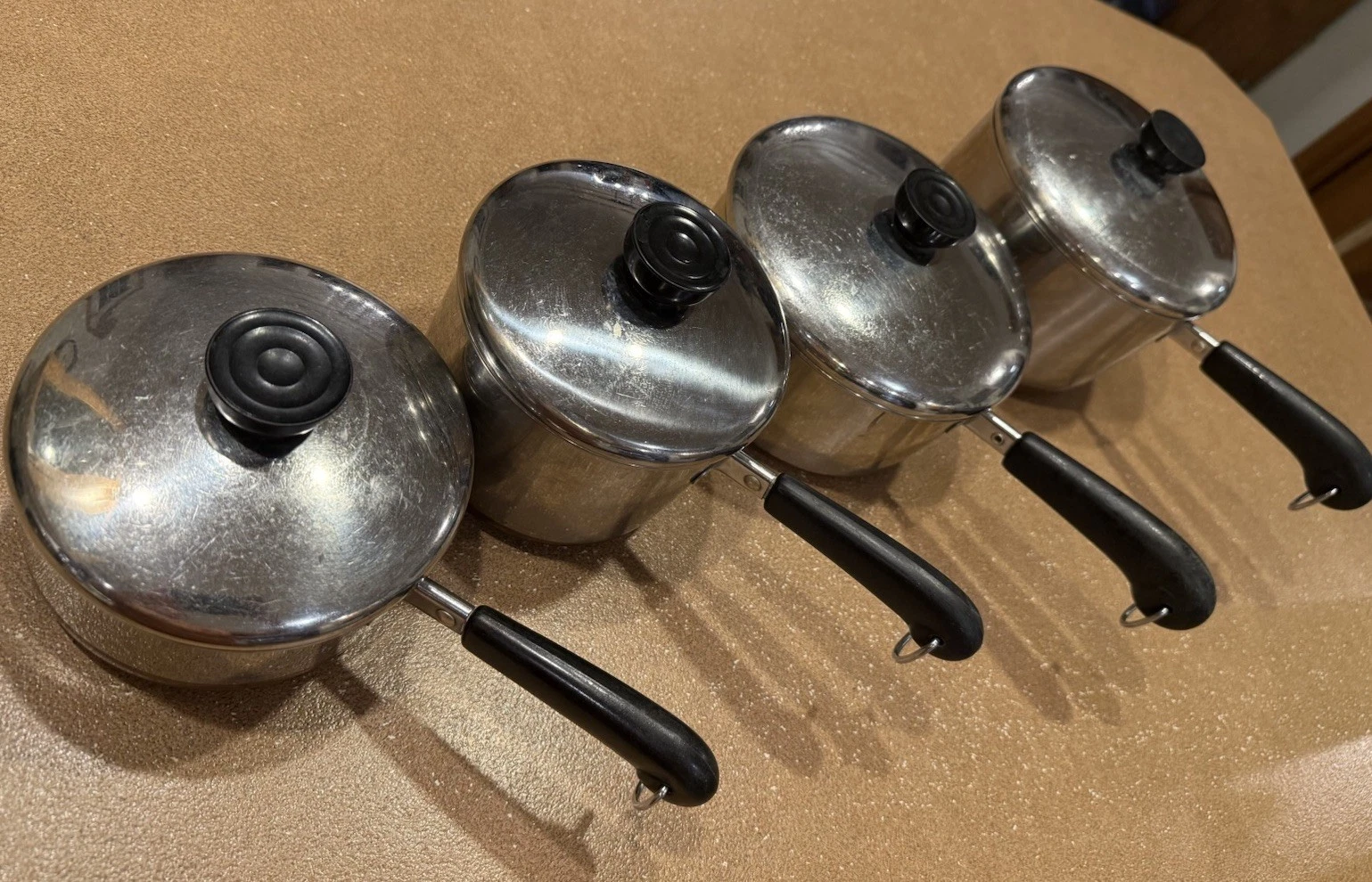 Revere Ware 1801 Copper Bottom 8-Piece Set with 4 Pots and Pans with Lids