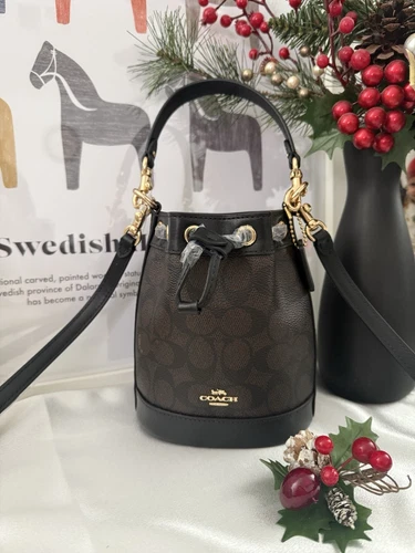 Coach CW299 Mini borsa a secchiello in tela e pelle firmata oro noce nero nuova con etichette