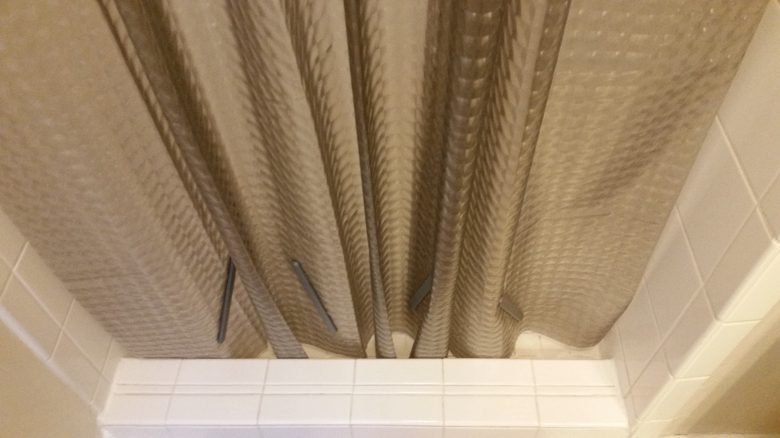 Shower curtain weights prevent your curtain or liner from drafts