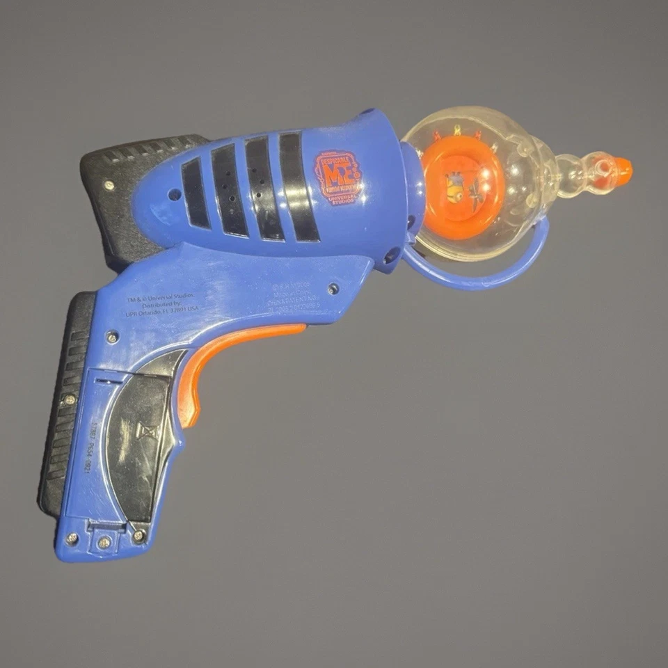 Pistola de juguete Minion Despicable Me Zapper Universal Studios iluminada giratoria / ¡Funciona! Foto 2 de 4