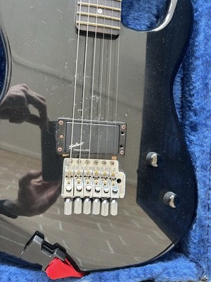B.C. Rich Rave Guitar with Hard Case. Used.