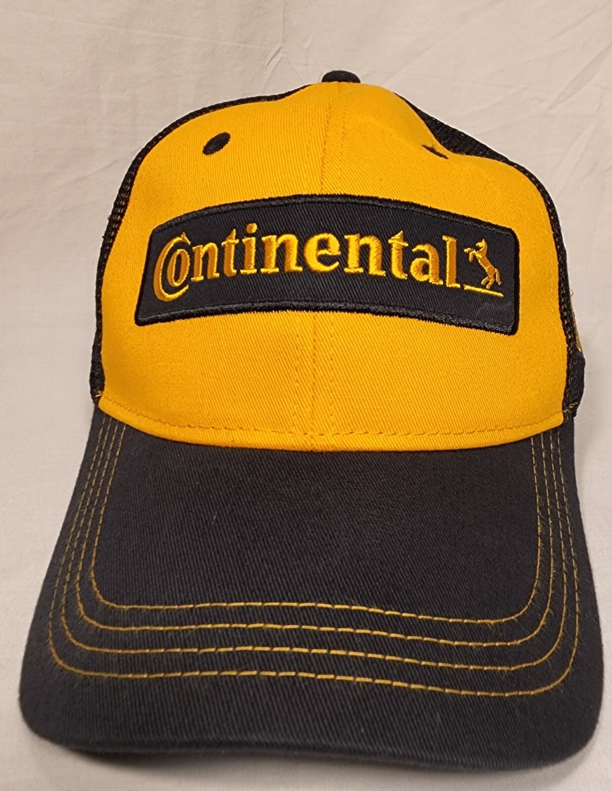 Trucker Hat with Adjustable Cardboard Liner and Water Stain-image