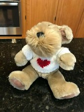 Vintage Dakin brown schnauzer plush dog wearing heart sweater
