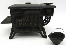 Vintage Queen Miniature Cast Iron Stove with Cast Iron Ash Bucket and Trivet.