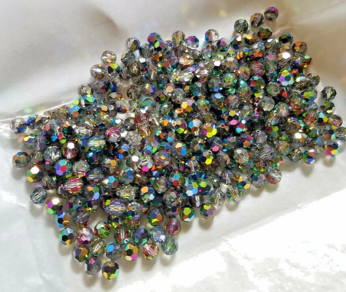 6mm round Swarovski beads (article 5000), aqua AB, 24 pieces