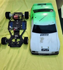 BOLINK ELIMINATOR AND FUTABA RC CAR CHASIS WHIT SHELL FOR PARTS VINTAGE 80'S