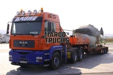 Foto camion MAN TGA 33.430 D20 Common Rail carico pesante Germania arancione BRU #j3jp