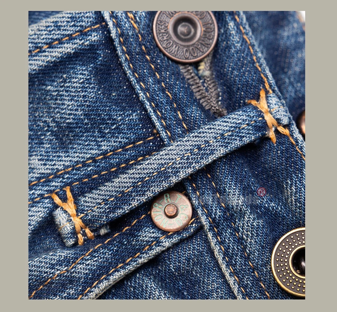 Red vintage 15oz washed denim jeans with button closure, front rip details, and two front flap chest pockets.