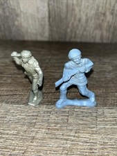 Two Small Frontiersmen Blue Gray Plastic Toy Figures