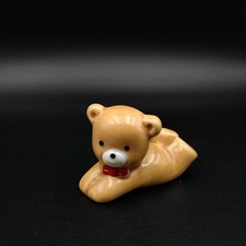 Vintage Ceramic Miniature Brown Teddy Bear Figurine Red Bowtie Laying Down