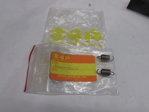 HEAD LAMP ADJUSTER SPRING