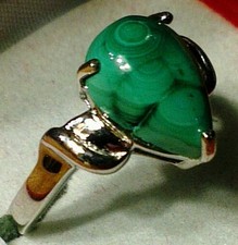 Pear cut malachite set in solid sterling silver ring setting.