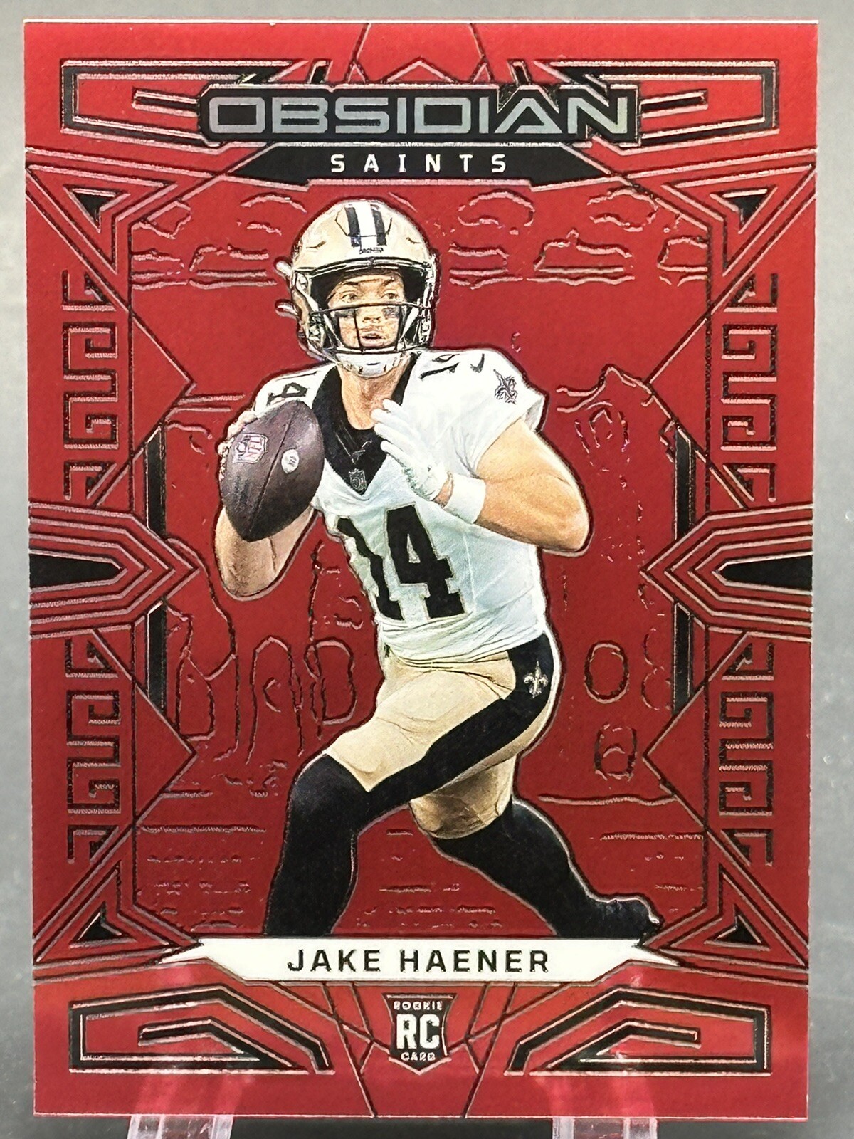 2023 Obsidian International Red Flood 172 Jake Haener Rc  /90 New Orleans Saints