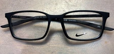NIKE 7282 001 52/17/145  COLOR  BLACK  NEW. COMES WITH CASE
