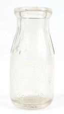 EMBOSSED MILK BOTTLE, TEBERCULIN TESTED MILK GOLDEN STAR DAIRY  