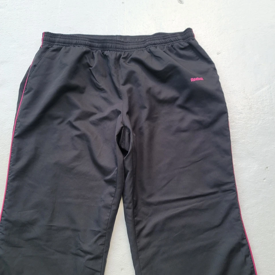 Pantalones para mujer Reebok cortavientos atléticos pista negro rosa forrados talla mediana Foto 3 de 4