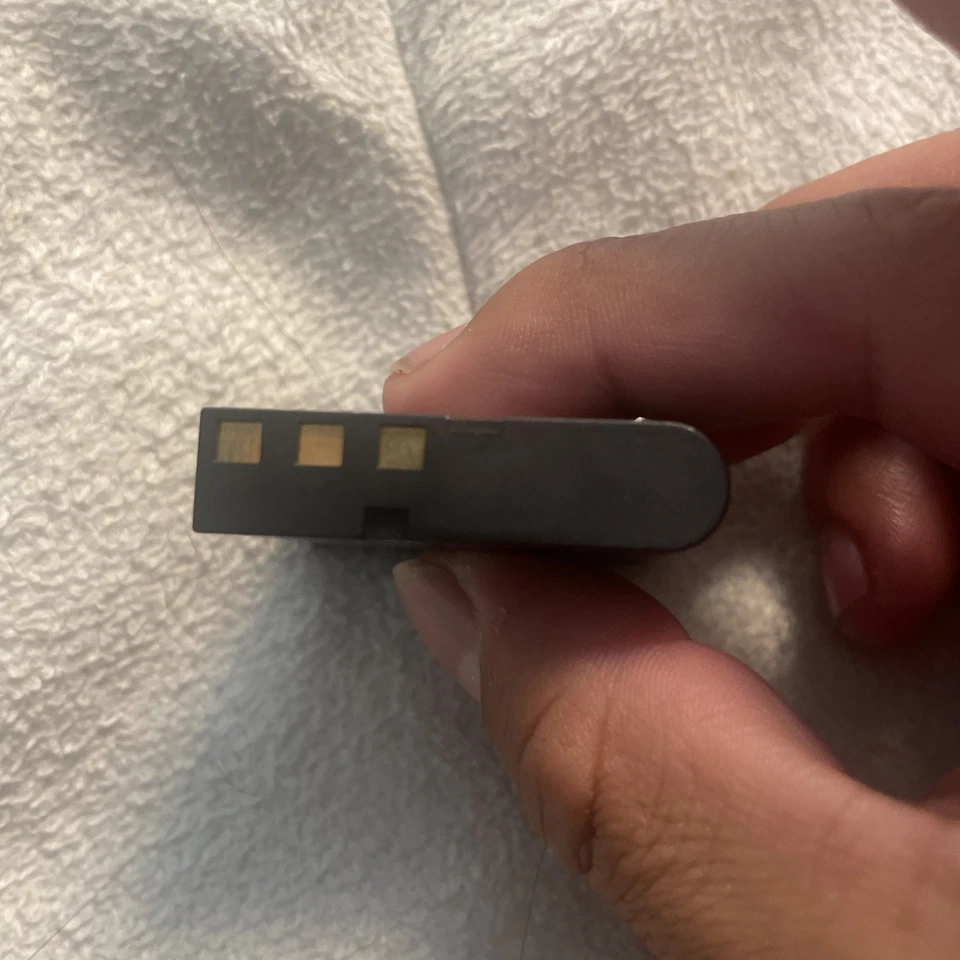 Cargador de batería de iones de litio Pentax LB-060 para cámaras réflex digitales Foto 4 de 4