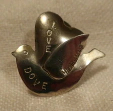 Love Dove pin or tie tack; Sterling Silver; Made in USA by Peggy Johnson, 1995