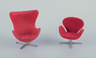Miniatures of the ''Swan'' and ''Egg'' chairs, designed by Arne Jacobsen.