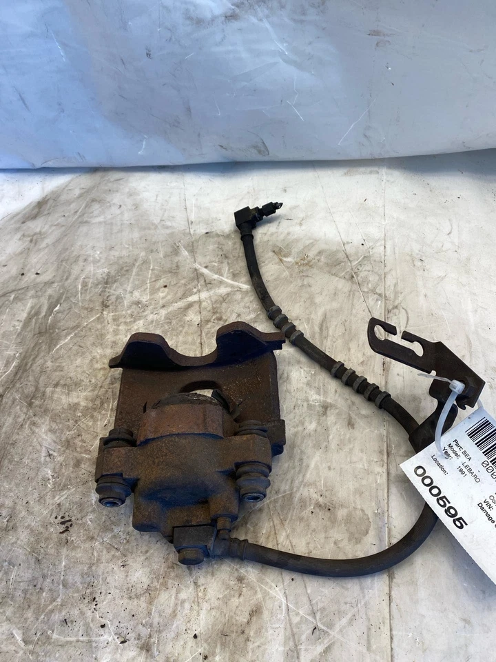 Pinza de freno de disco delantera izquierda Chrysler Lebaron 1991-1994 3,0 L lado del conductor izquierda Foto 4 de 4