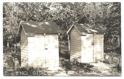 Real Photo Postcard - Two Outhouses in the Woods - ''No Sit Down Strikers...''