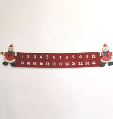 Vintage condition Advent calendar with two gnomes and pockets for surprizes