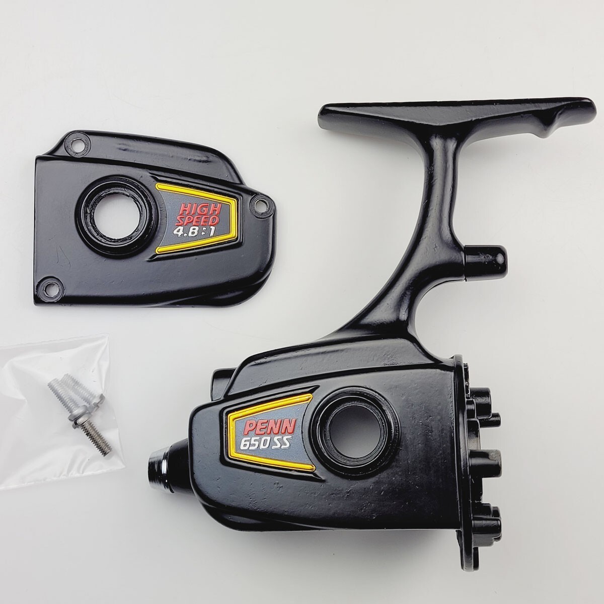 Lot Pièces Penn Spinfisher 650 SS - Couvercle Latéral + Roulement - Black & Gold