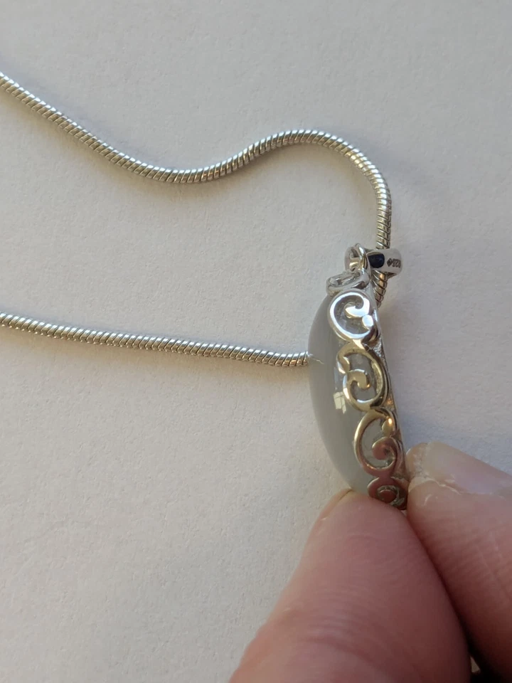 Colgante de calcedonia limpia de ojos natural 16x12 mm con ajuste S925 g/chapado en rodio Foto 3 de 4